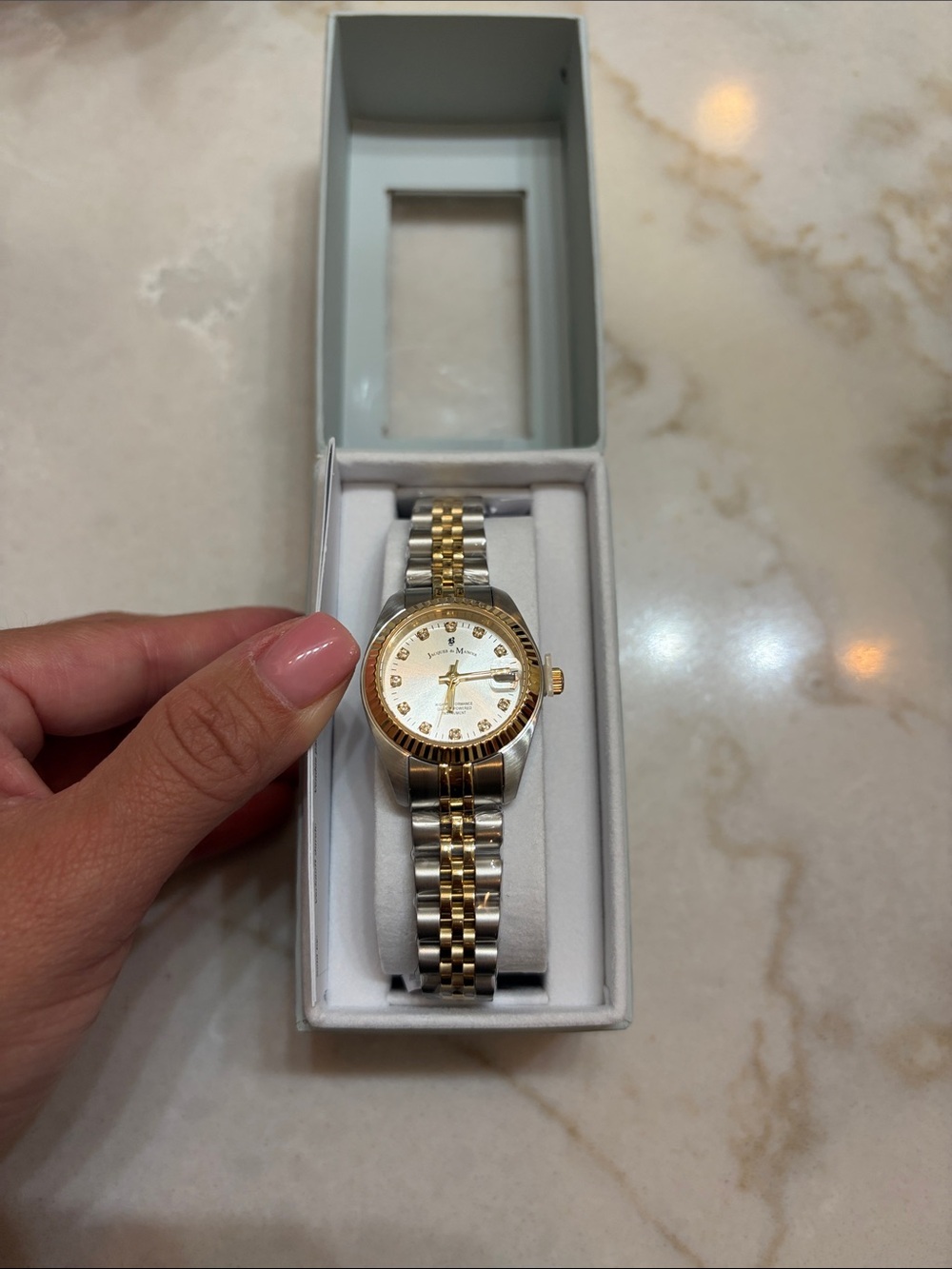 Silver and Gold Watch by [Brand]